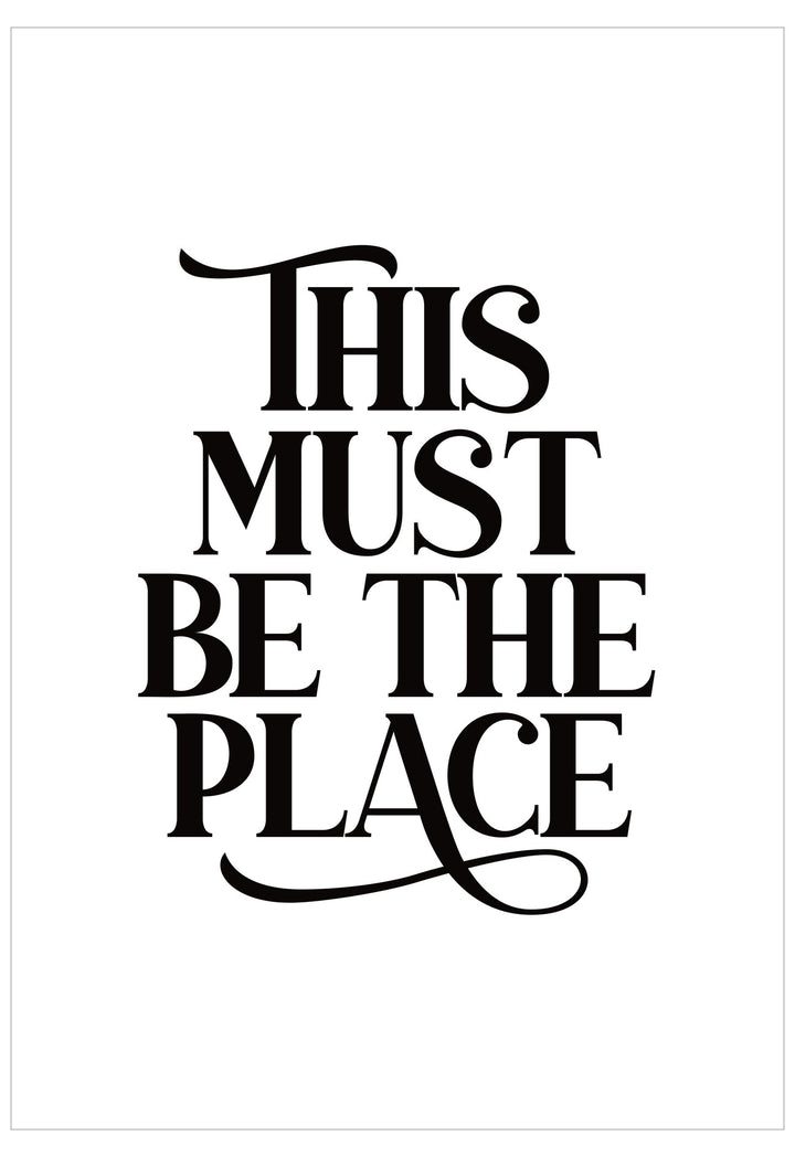 Black text 'THIS MUST BE THE PLACE' on a white background