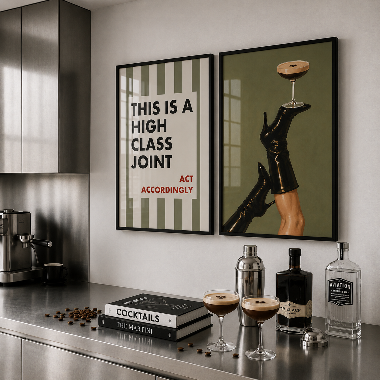 Modern kitchen with cocktail-making setup and framed art on the wall.