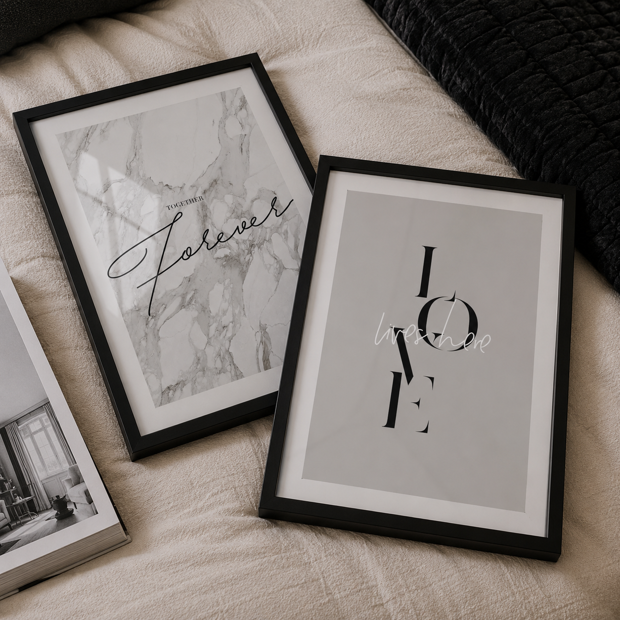 Two framed prints on a textured surface with 'Forever' and 'LOVE' text.