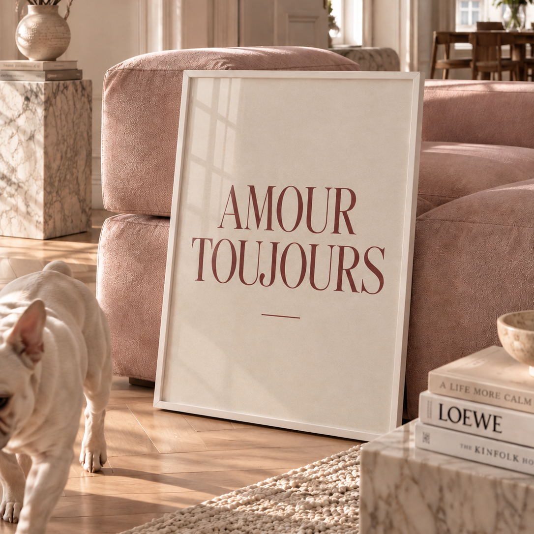 Toujours Poster featuring the French words “Amour Toujours” in elegant deep red serif typography on a softly textured warm ivory background.