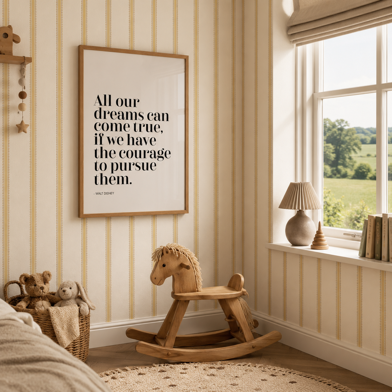 A framed wall art print with a motivational quote hangs on a cream and tan striped wallpapered wall in a styled children's room corner, featuring a rocking horse, teddy bears, a window, and a lamp.