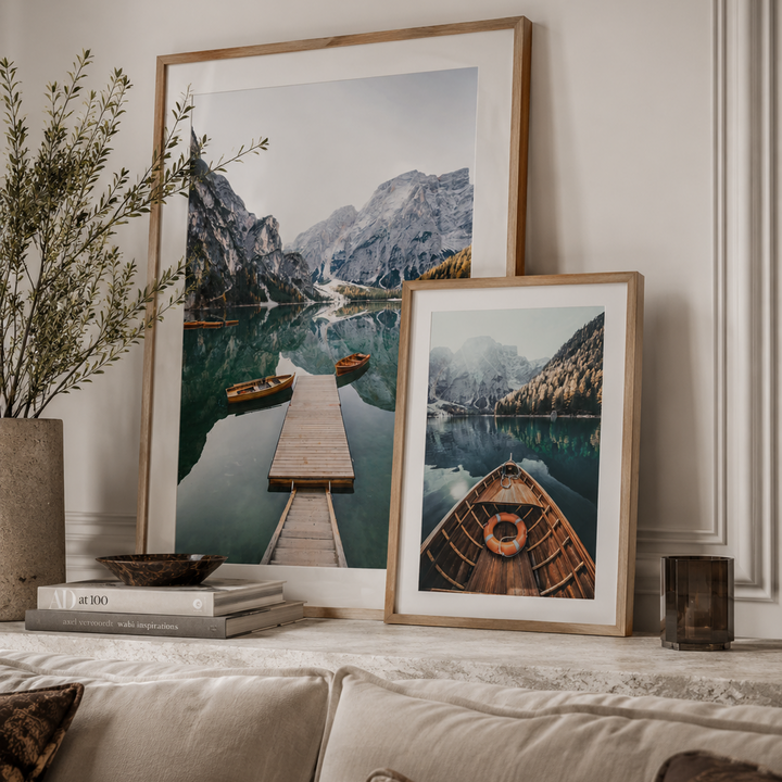 art work of boats in an italian lake in a luxury living room