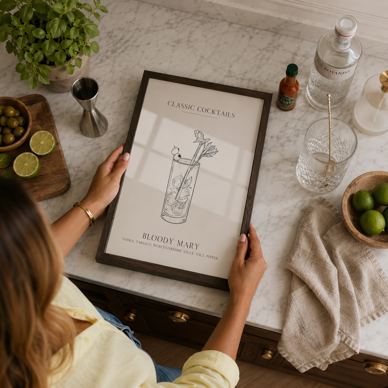 classic cocktail poster in walnut frame in modern kitchen