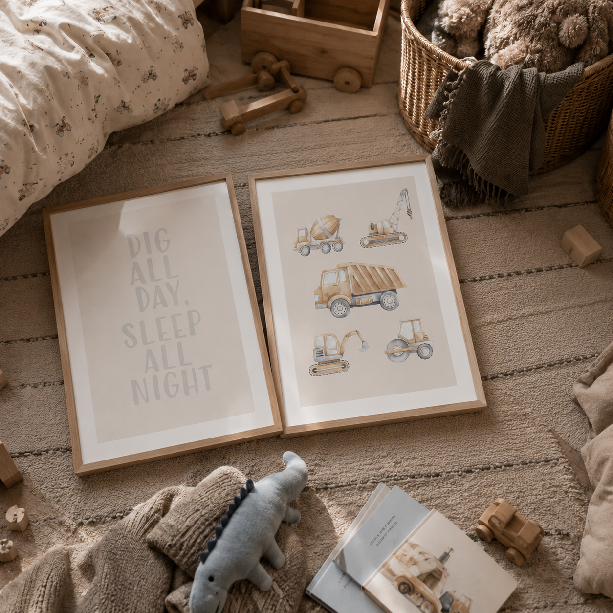 Two framed nursery wall art prints displayed on a woven rug in a styled children's room. One print features the text 'DIG ALL DAY.