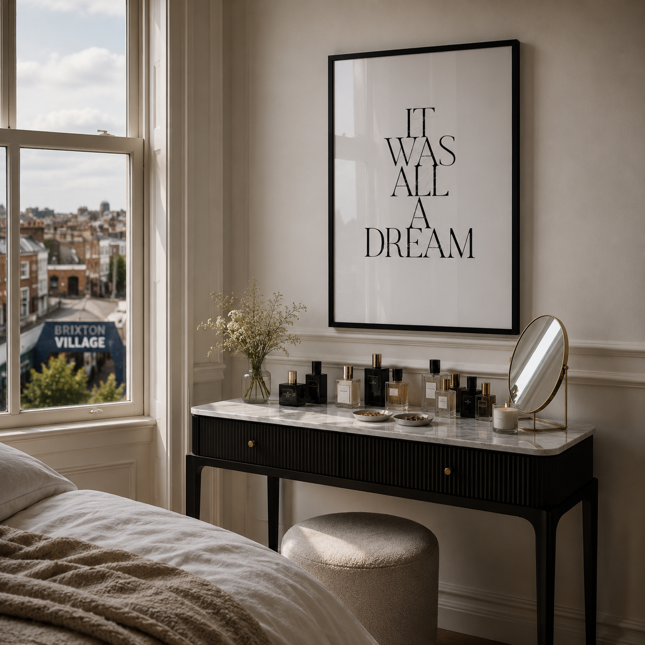 Room interior with a desk, mirror, and framed quote above it, featuring a cityscape view.