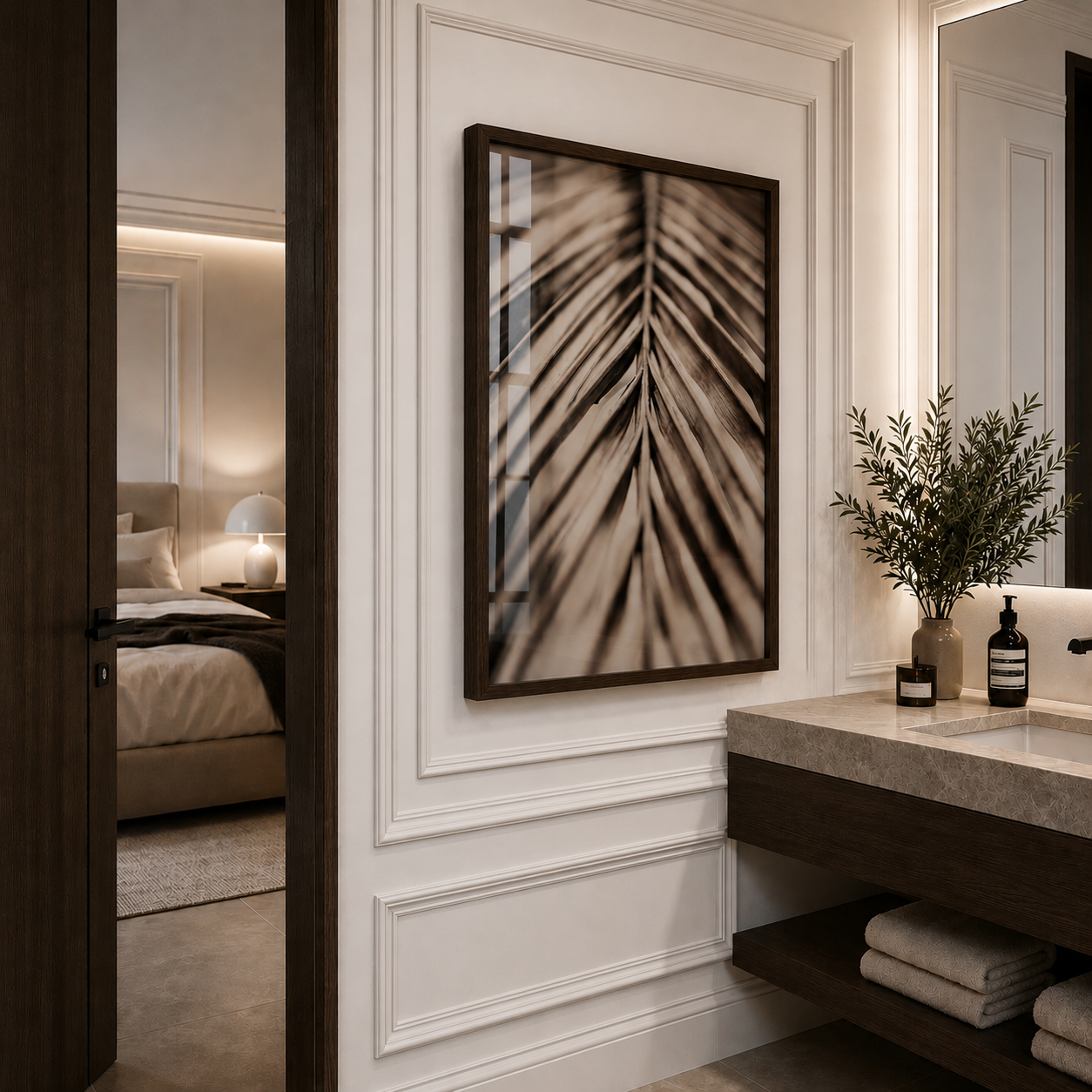 Modern bathroom interior with framed artwork and decorative elements.