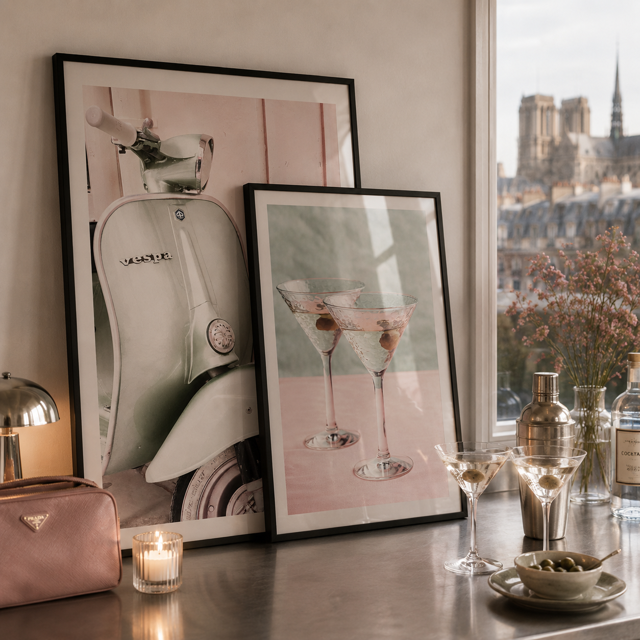 Home decor with framed pictures of a scooter and martini glasses, candles, and a cityscape view.