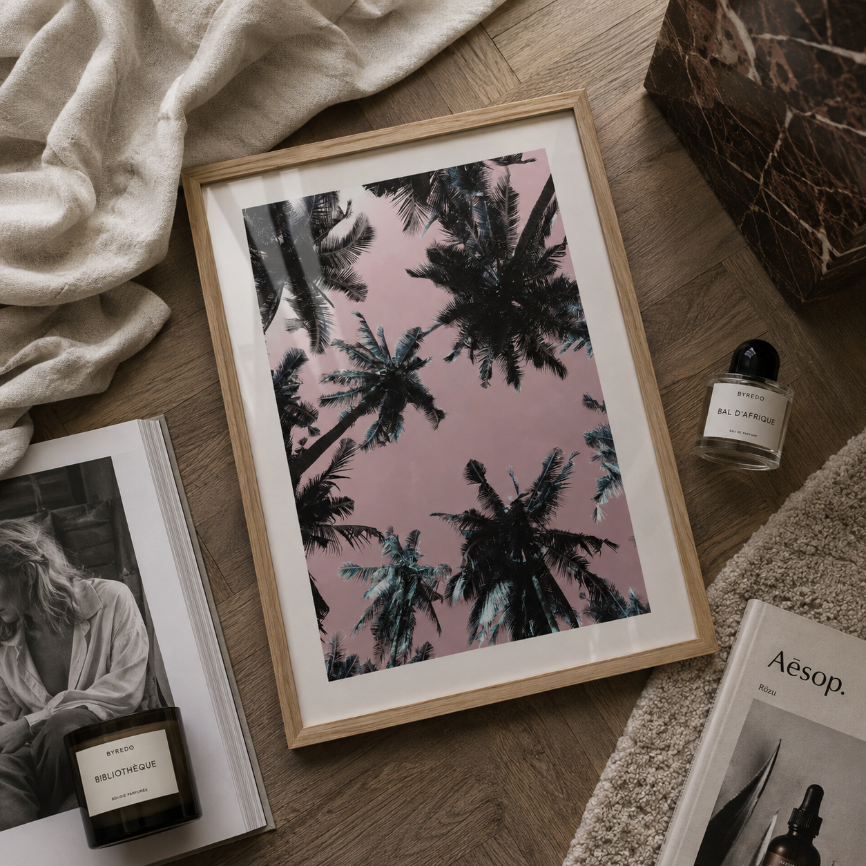 Luxury botanical wall art of palm trees in a oak frame in a stylish home