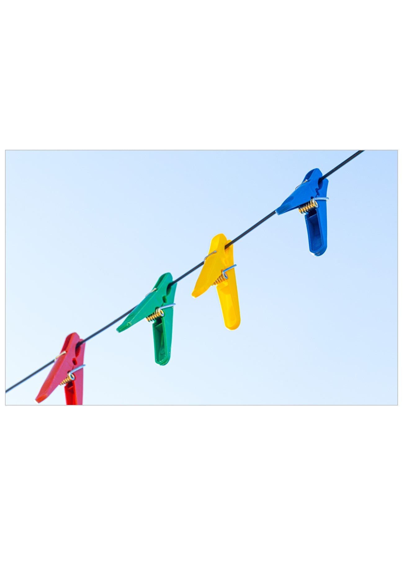 Colourful pegs on a washing line wall art