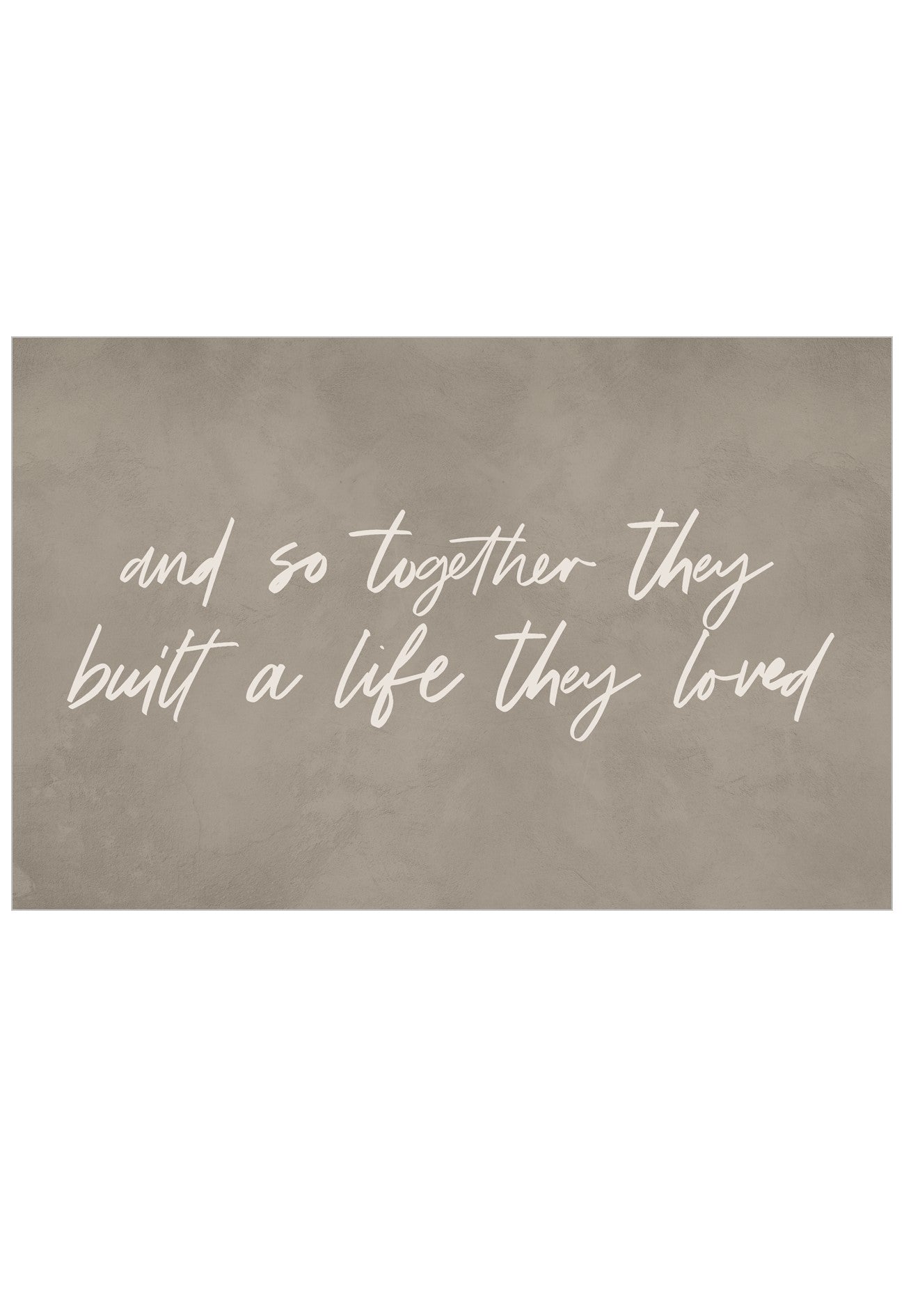 A rectangular wall art print with a textured taupe-brown background and white script text reading, 'and so together they built a life they loved.'.