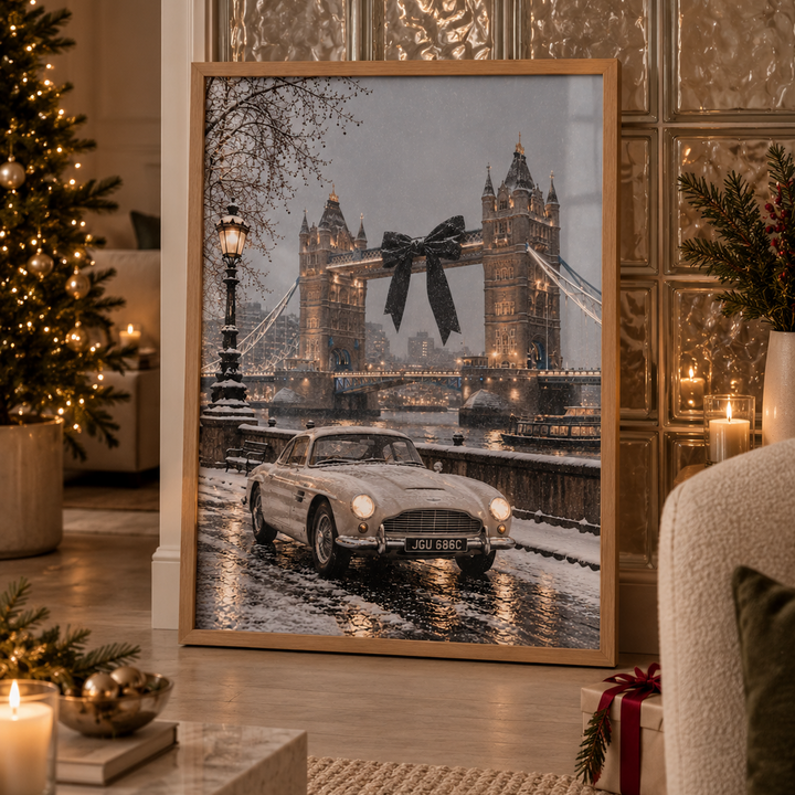 Luxury poster depicts snow falling gracefully over Tower Bridge, accompanied by a classic white vintage sports car against a serene snowy backdrop.
