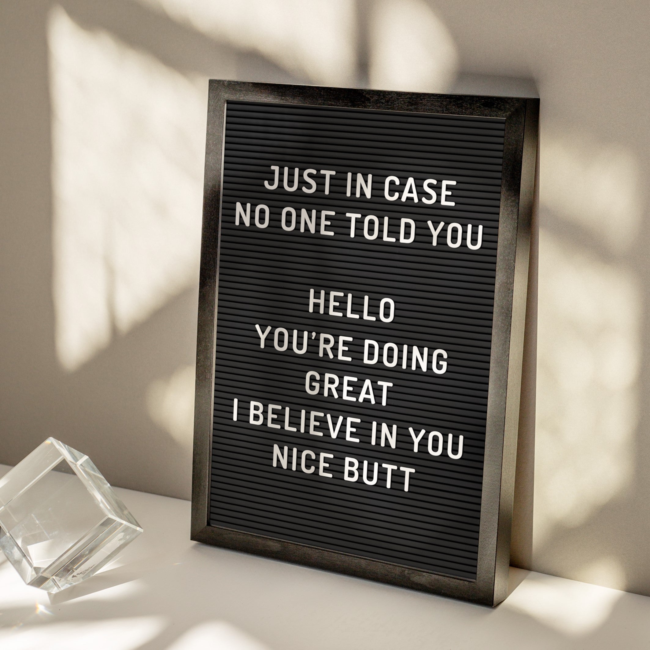 nice butt poster framed in a black wood poster frame